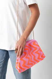 Grafische beach clutch roze oranje